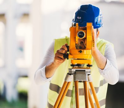 Picture of male construction engineer working on building site